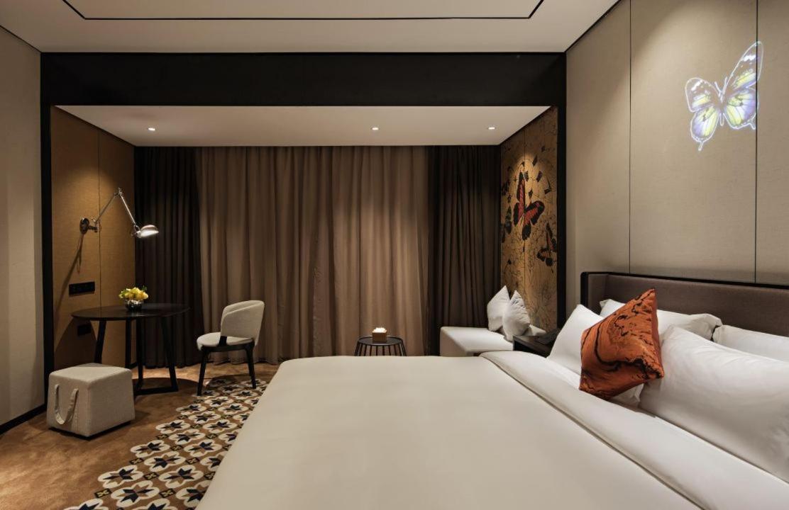 Paco Hotel Chebeinan Metro Guanghzou Guangzhou Rom bilde